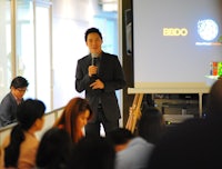 a man is speaking into a microphone