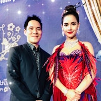 a man and a woman standing next to each other